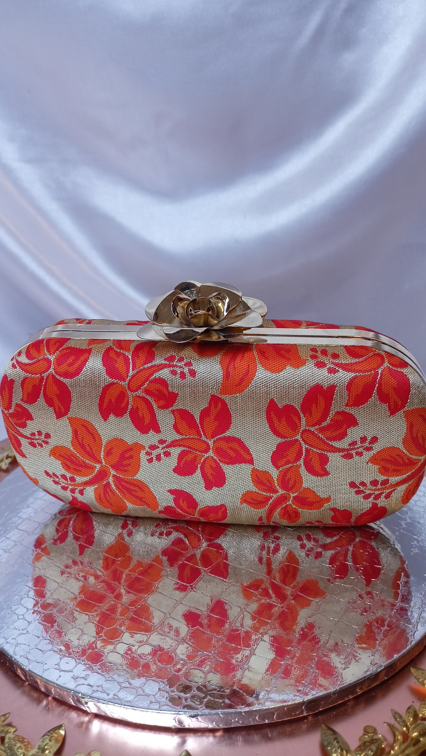 ORANGE CAPSULE CLUTCH