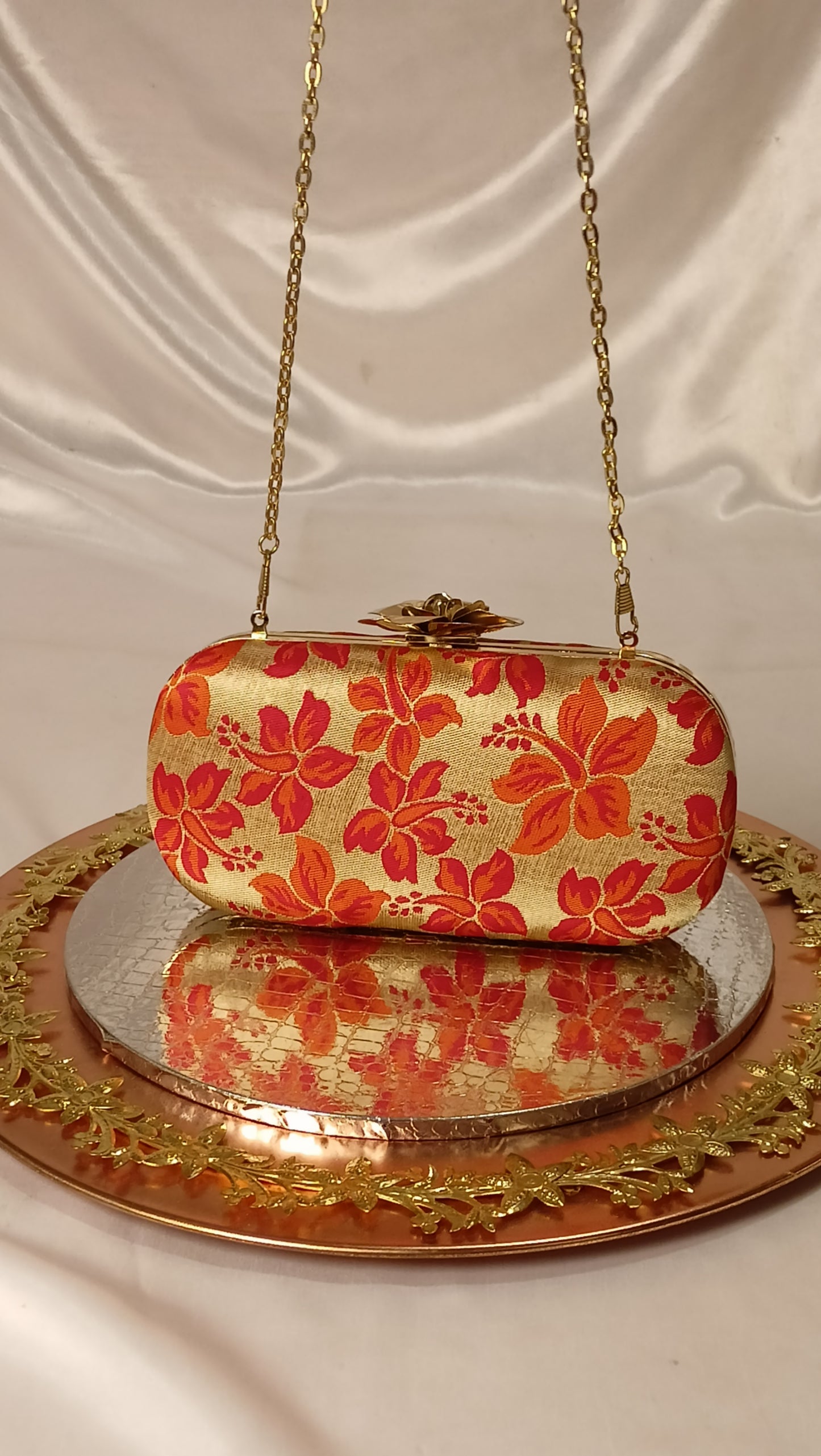 ORANGE CAPSULE CLUTCH