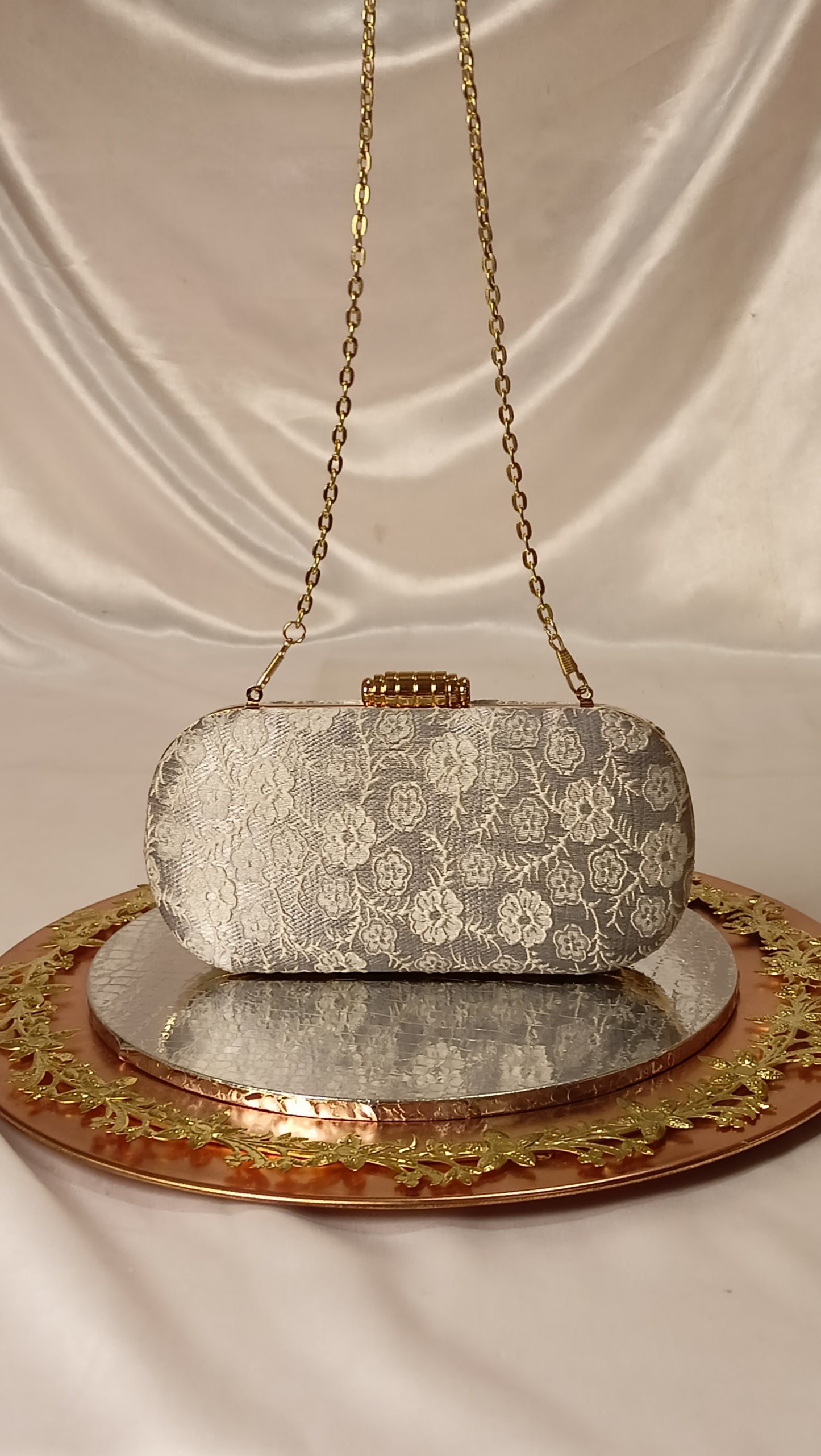 GREY CAPSULE CLUTCH