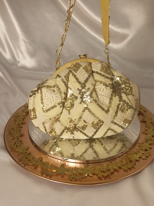 CREAM GOLDEN BATUA CLUTCH